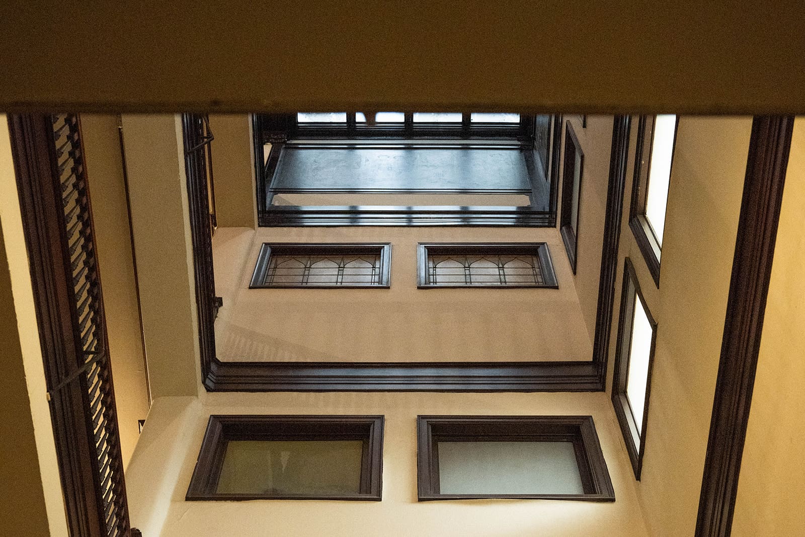 Image Description: The stairwell of the Fine Arts Building, looking up toward skylights.