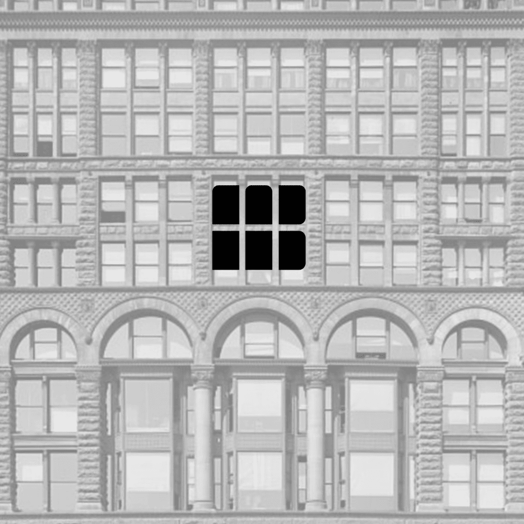 Image Description: The Fine Arts Building's new logo overlaid over the building's windows.