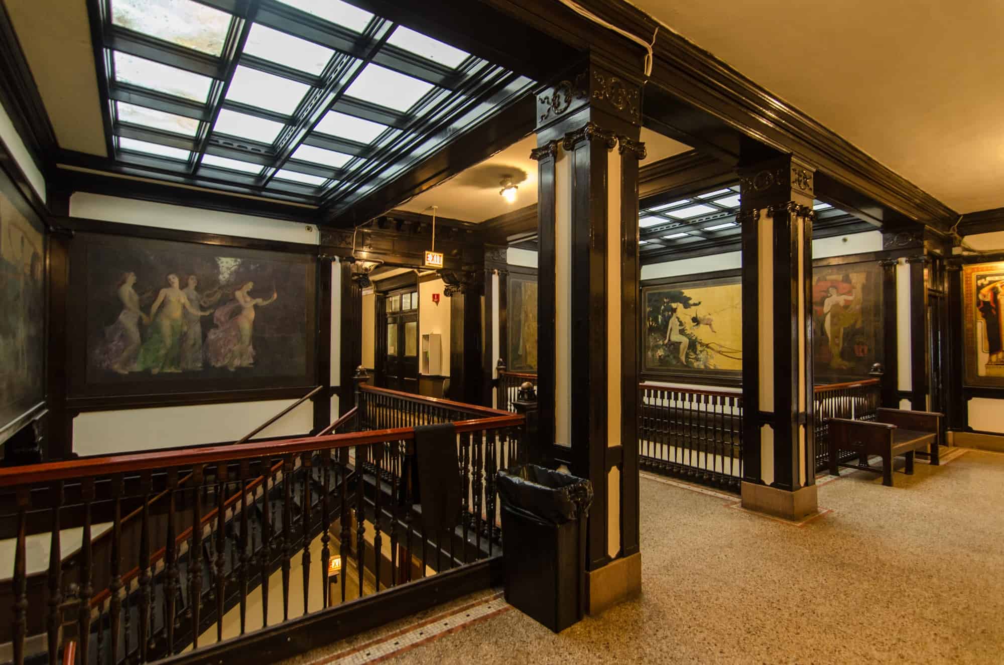 Image Description: 10th floor stairwells and murals at the Fine Arts Building.